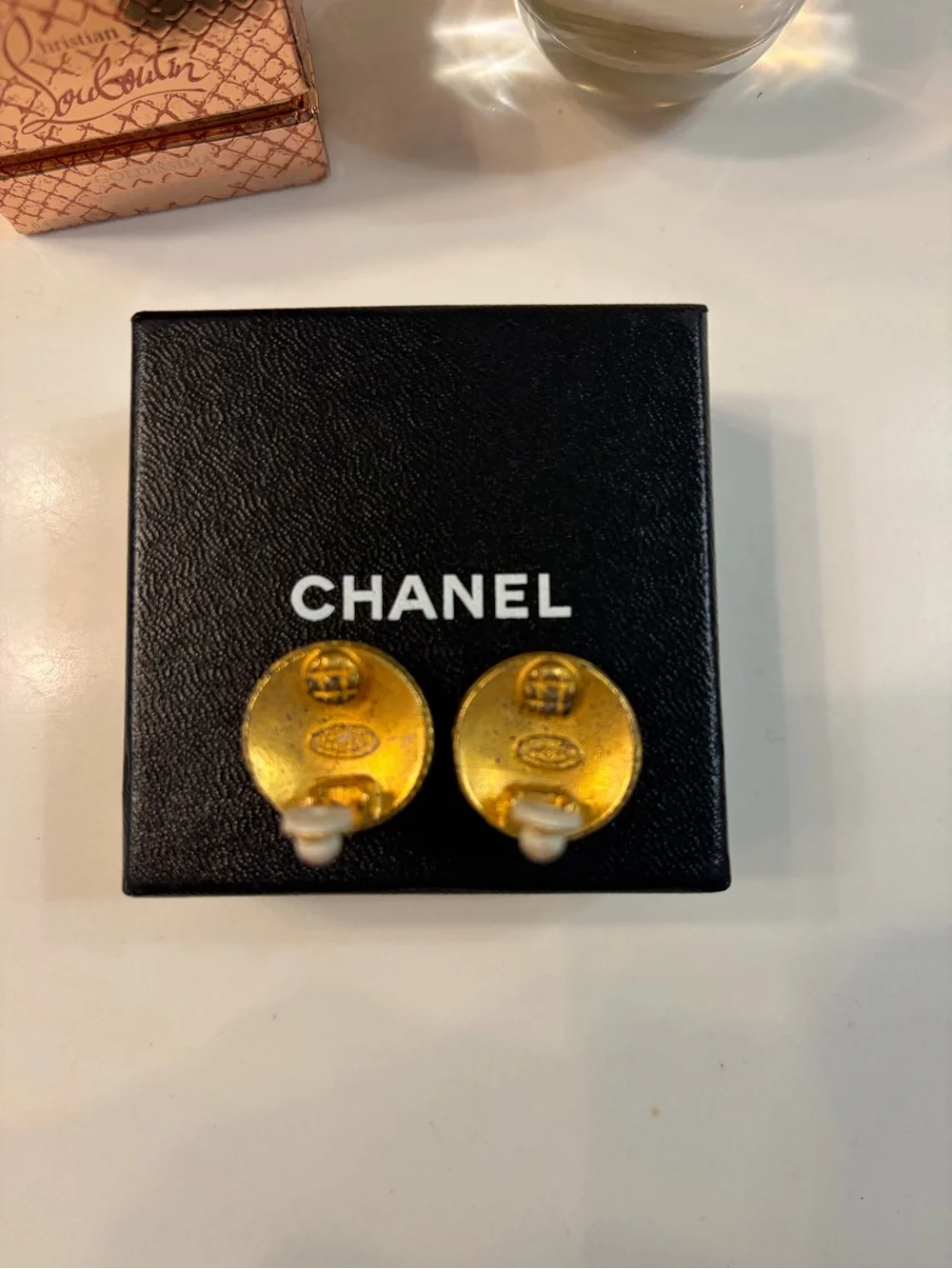 CHANEL Gold Floral Medallion Button Earrings